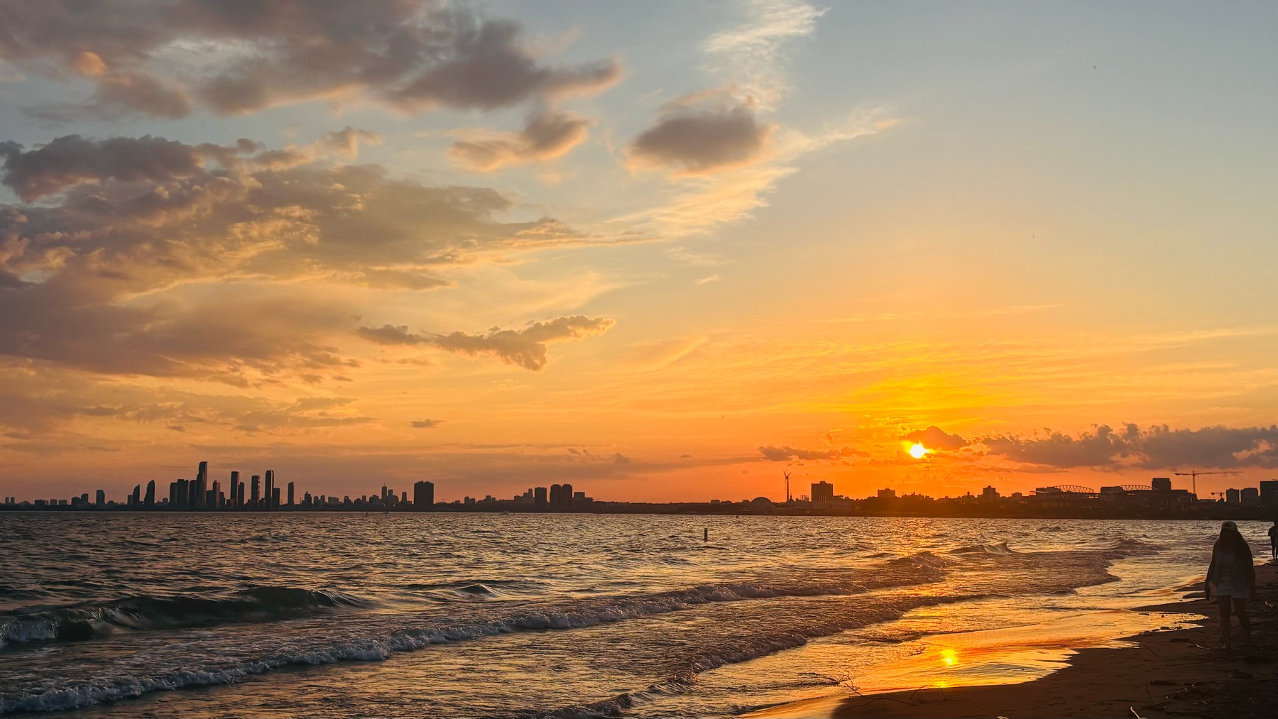 A vibrant sunset over the ocean, one of Aasawari's favourite things to chase